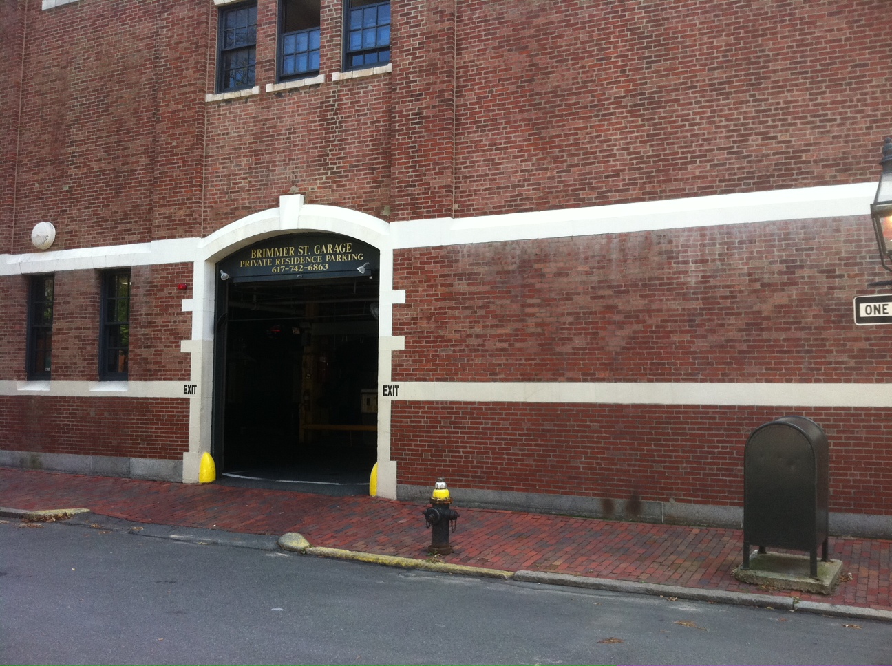 The exit of the famous Brimmer Street Garage, where the first parking space condominiums were developed in 1979. 